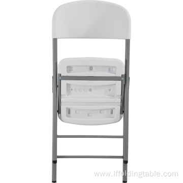 White plastic folding chair